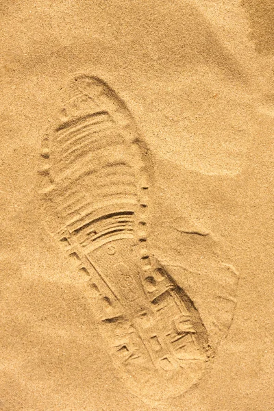 Shoeprint i sanden — Stockfoto