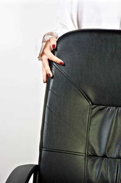 Krzesło firmy dłonią dziewczynki — Zdjęcie stockowe