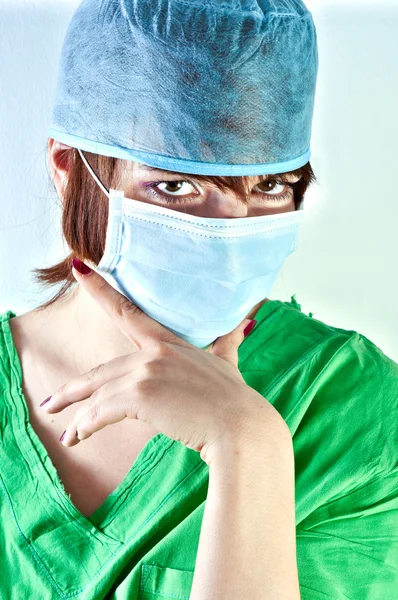 Young doctor looking and thinking — Stock Photo, Image