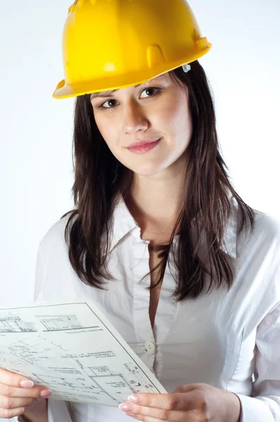Mulher de negócios bonita com planos de construção — Fotografia de Stock