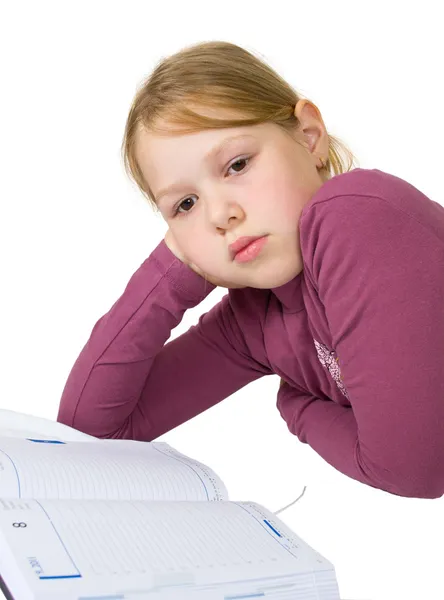 stock image Little girl sleeping while doing her studies