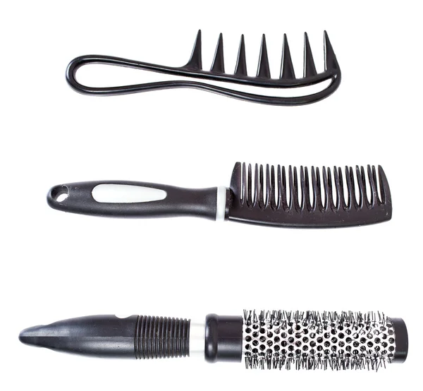 stock image Three hairbrushes on white background