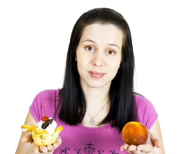 stock image Girl with peaches and cake on white