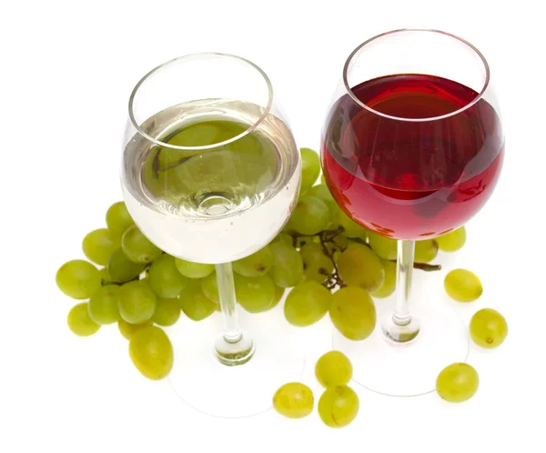 stock image Glasses of white and rose wine and grapes over white