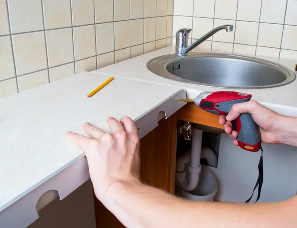 stock image Hand and electric screwdriver