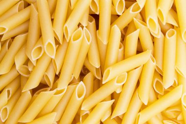 Italian penne pasta background clipart