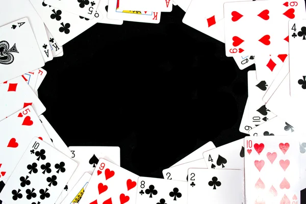 Playing cards isolated on black background