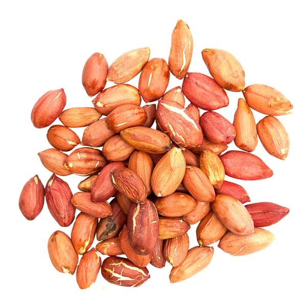 stock image Pile of peanuts with skin isolated on white.