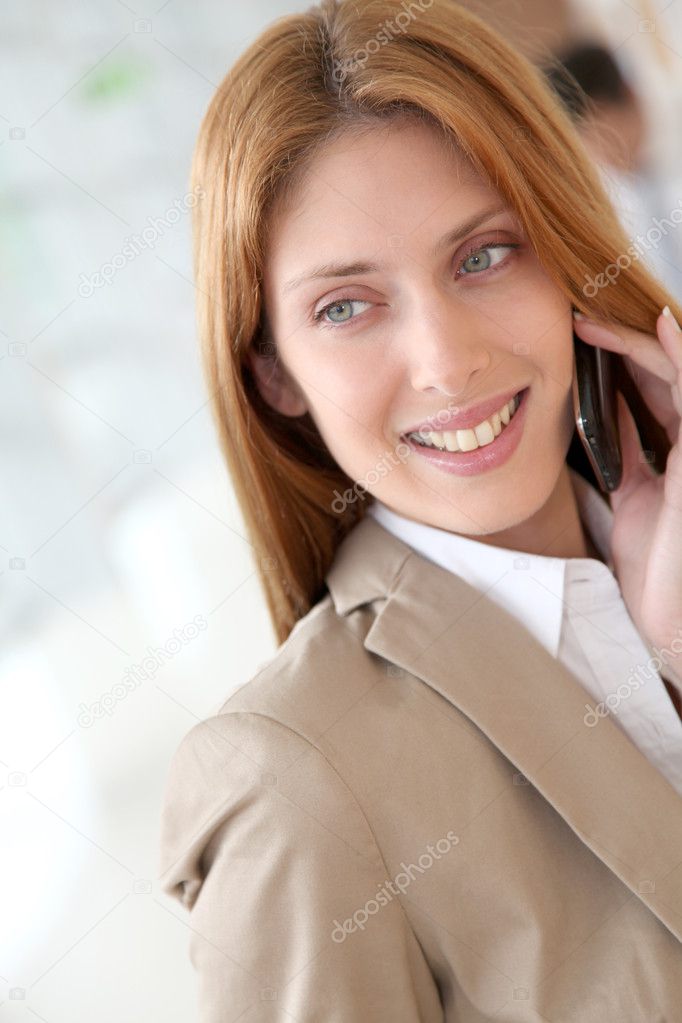 Portrait of beautiful businesswoman talking on mobile phone