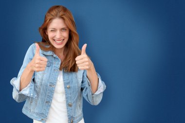 Portrait of beautiful woman on blue background clipart