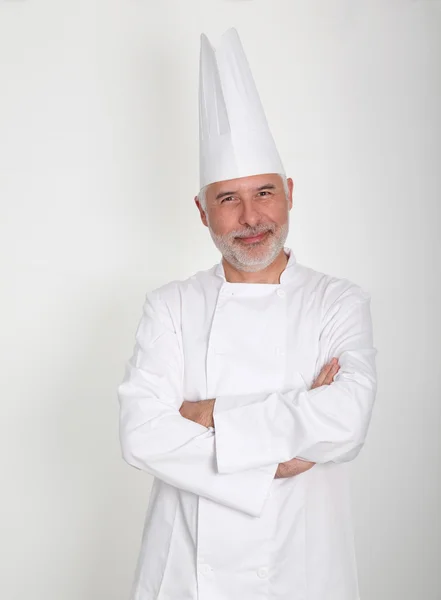 Chef senior con los brazos cruzados —  Fotos de Stock