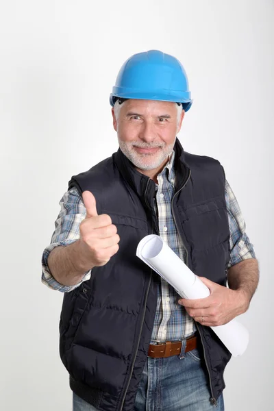 Керування будівельними майданчиками з захисним шоломом — стокове фото