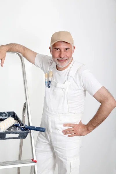 Επαγγελματίας Ελαιοχρωματιστής στέκεται πάνω σε λευκό φόντο — Φωτογραφία Αρχείου