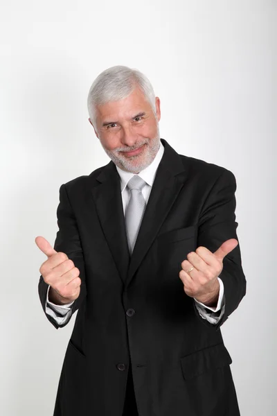 Portret starszego biznesmen Wyświetlono kciuk w — Zdjęcie stockowe