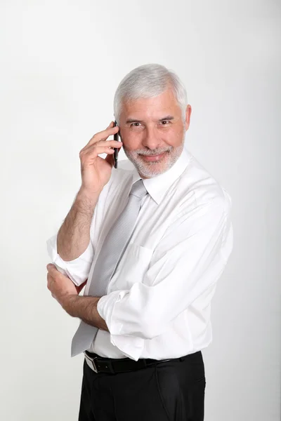Försäljningschef talar i mobiltelefon — Stockfoto