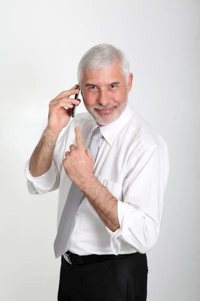 Verkaufsleiter telefoniert mit dem Handy — Stockfoto