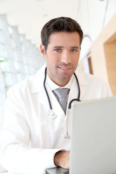 Portrait of young doctor at work — Stock Photo, Image