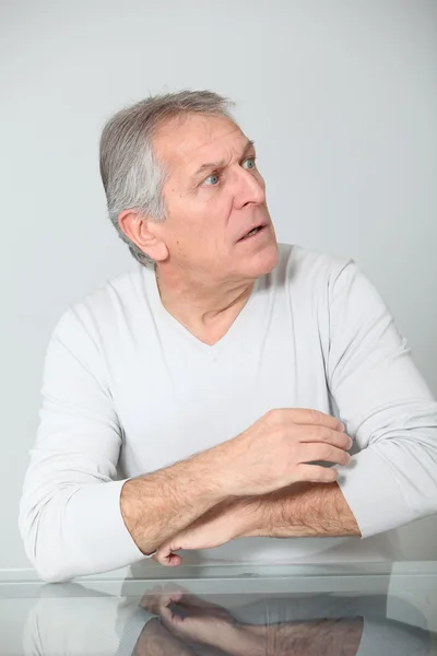 Senior man with scared look — Stock Photo, Image