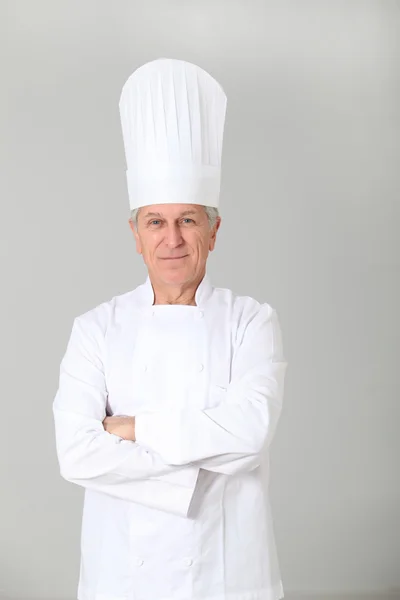 Closeup of standing chef on white background — Stock Photo, Image