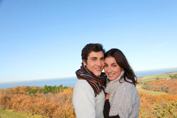 Portrait of happy couple in fall season — Stock Photo, Image