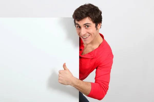Portret van een jonge man met whiteboard — Stockfoto