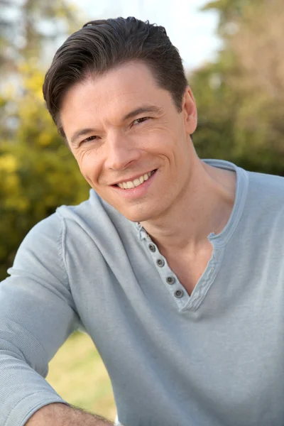 Portrait of smiling handsome man — Stock Photo, Image