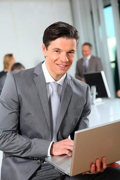 Businessman working on laptop compute Stock Photo