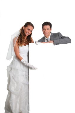 Bride and groom holding whiteboard clipart