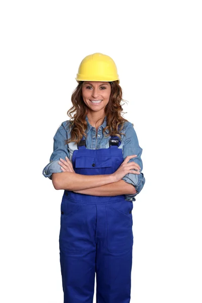 Žena s žlutým bezpečnostní helma — Stock fotografie