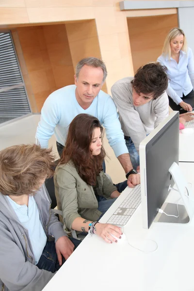 Group of students attending training course at school — Stock Photo, Image