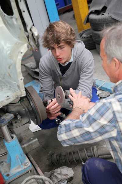 Teenager in professional training in workshop