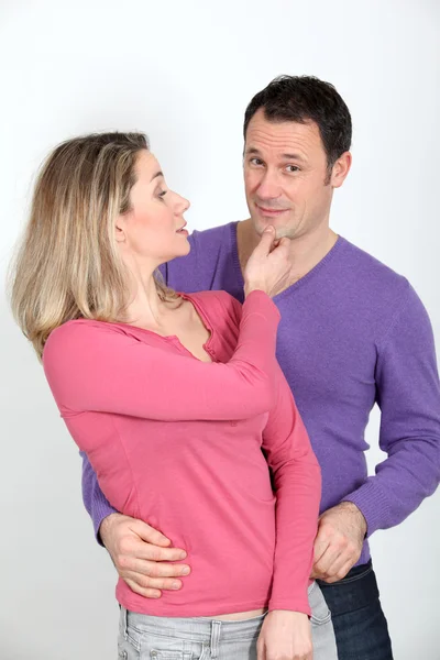 Woman pinching her boyfriend's chin — Stock Photo, Image
