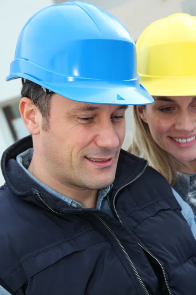 Closeup of architects with security helmets — Stock Photo, Image
