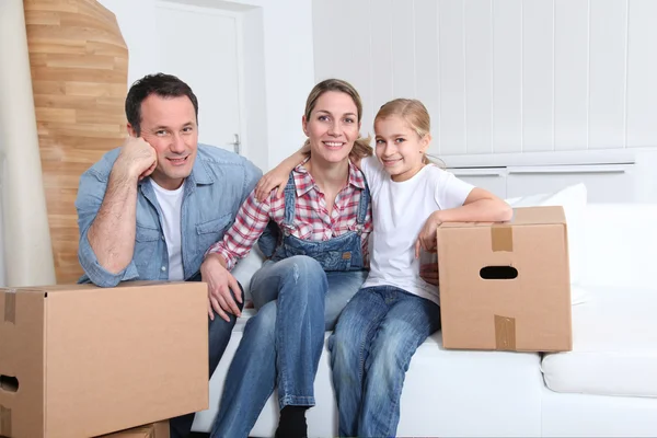 Happy family moving in new house — Stock Photo, Image