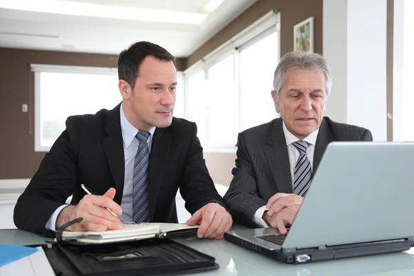 Business partners in work meeting — Stock Photo, Image