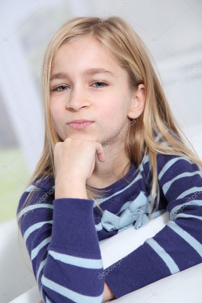 Portrait of 10-year-old blond girl Stock Photo by ©Goodluz 6698129