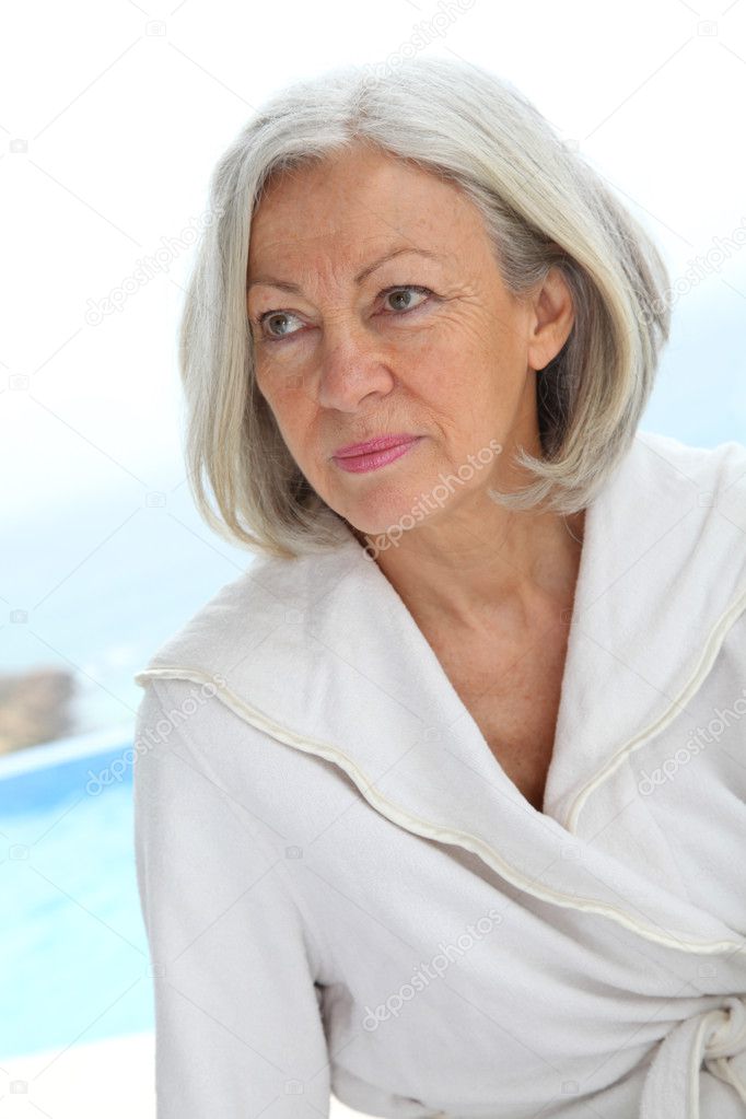 Portrait of senior woman in bathrobe
