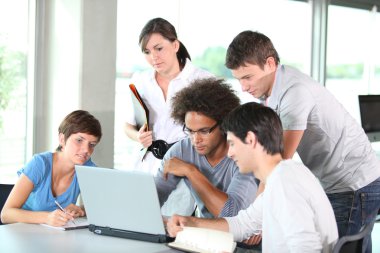 Group of young in business meeting clipart