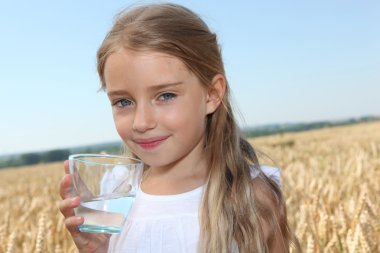 Little girl drinking wtaer clipart