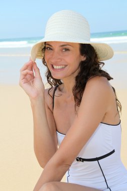 Beautiful woman at the beach clipart