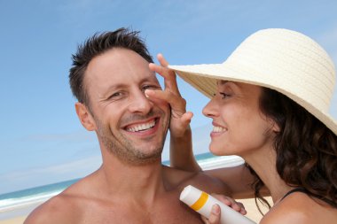 Happy couple at the beach clipart