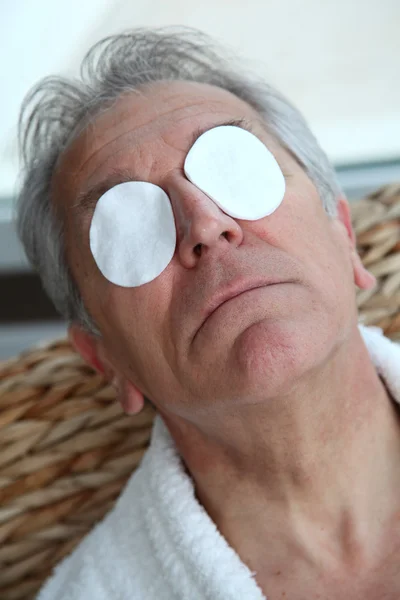 stock image Senior trying to ease eyes pain