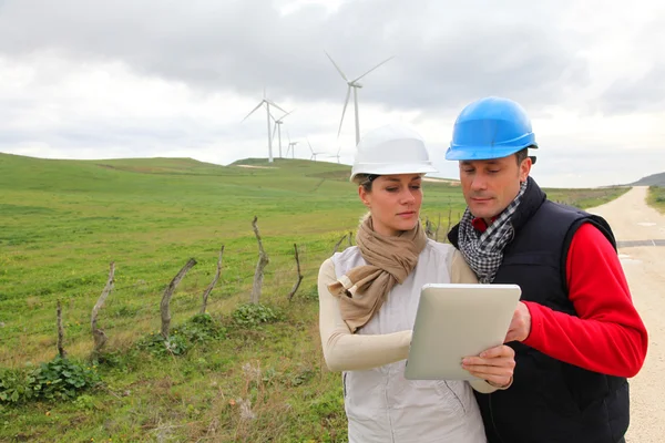 Engineers working with electronic tablet — Stock Photo, Image