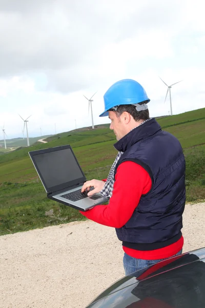 Engineer working in wind turbines field — Stock Photo, Image