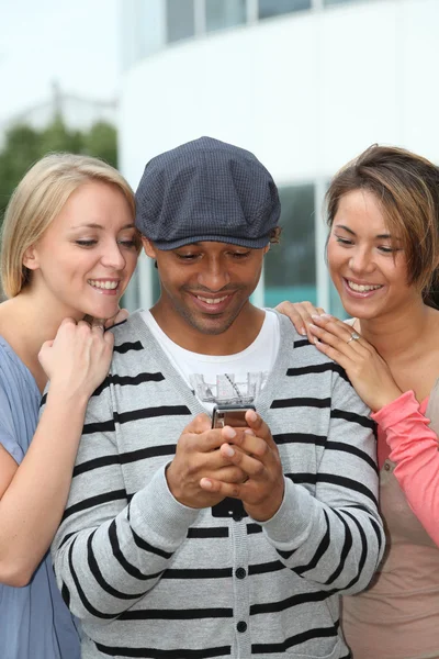 Group of friends with mobile phone — Stock Photo, Image