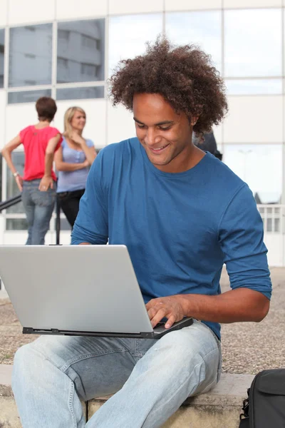 Student with laptop computer — Stock Photo, Image