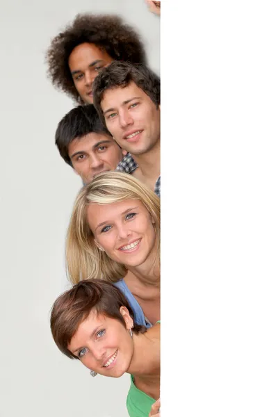 Group of young with message board — Stock Photo, Image