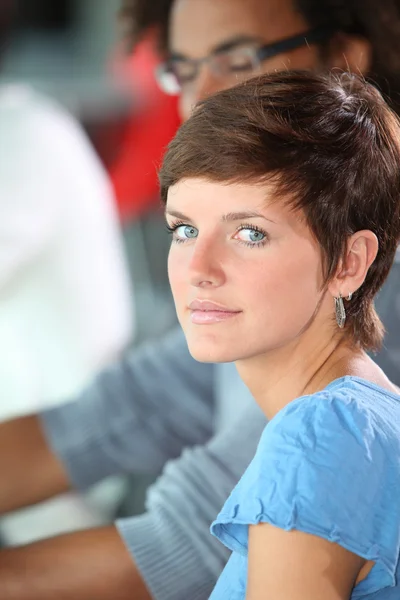 Jonge vrouw met blauwe ogen — Stockfoto
