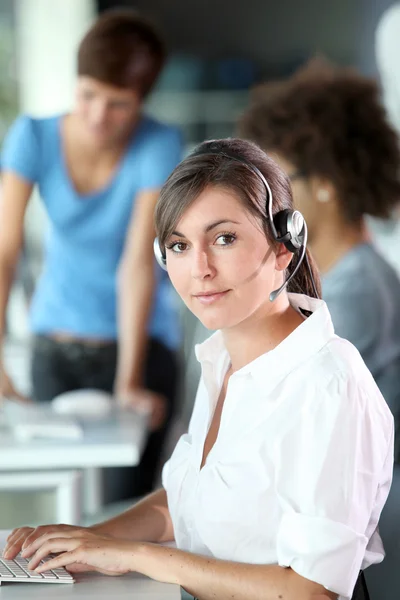 Closeup of young woman with headphones — Stock Photo, Image