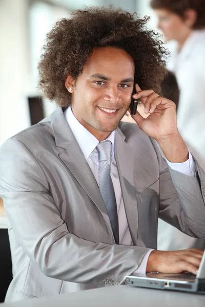 Happy businessman in the office — Stock Photo, Image
